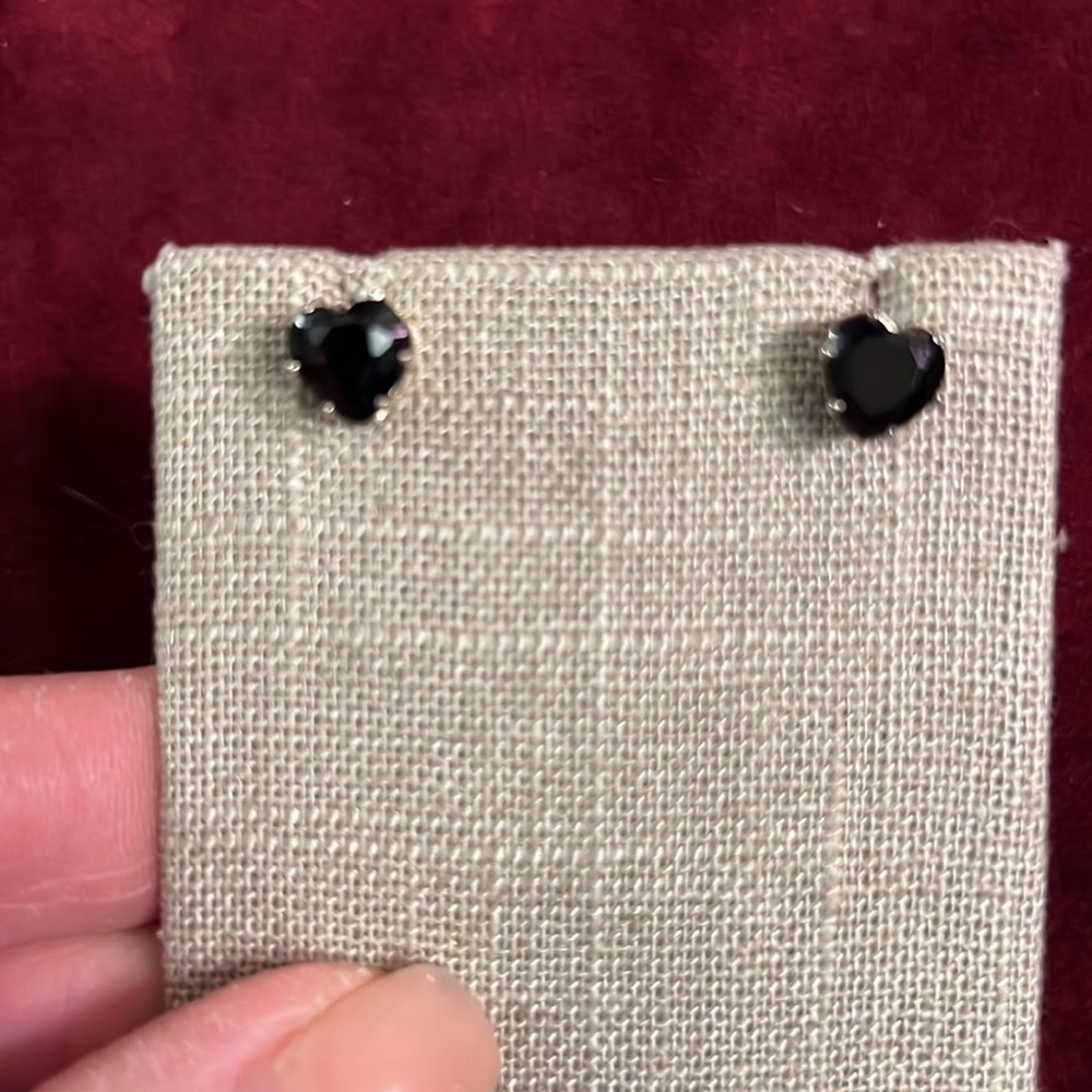 Beautiful heart shaped stones believed to be a black stone onyx maybe.